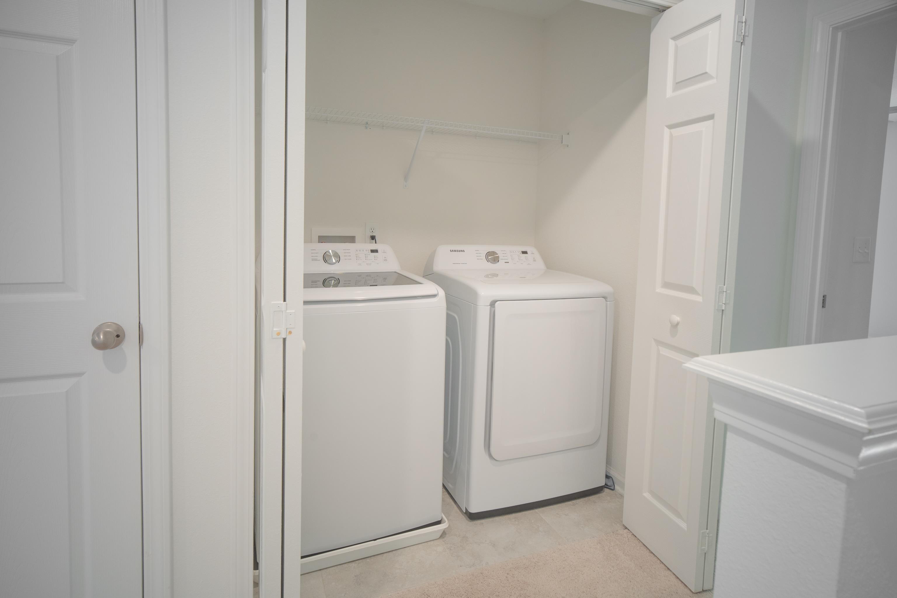 26 Ridge Lake Road St. Augustine, FL 32086 - Photo 16 of 27 a utility room with dryer and washer