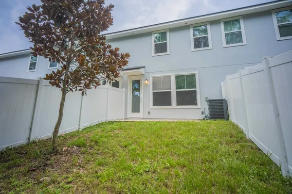 a view of front door and yard