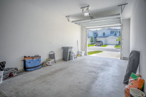 a bedroom with furniture and a tub