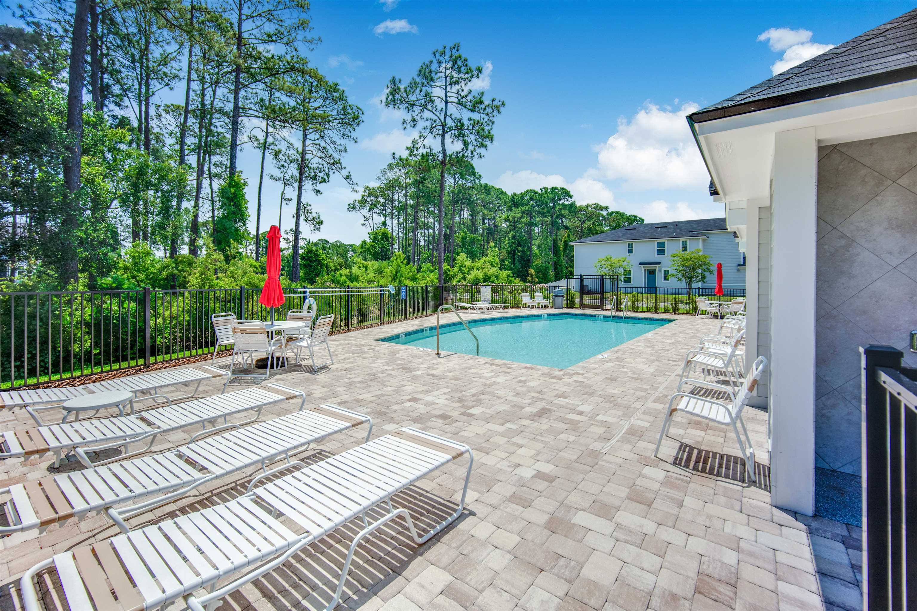 26 Ridge Lake Road St. Augustine, FL 32086 - Photo 24 of 27 a view of a backyard with sitting area