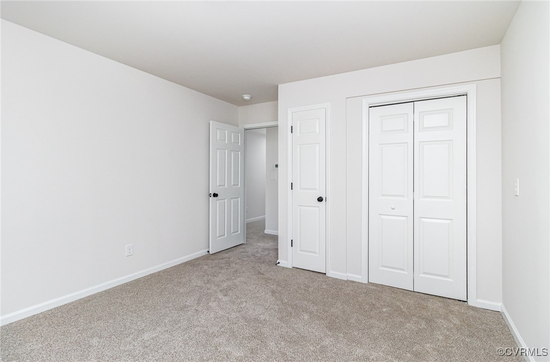 24 Hummingbird Lane Cumberland, VA 23040 - Photo 12 of 38 a view of an empty room