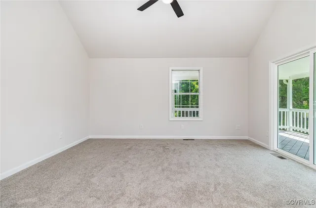 an empty room with a empty space and a window