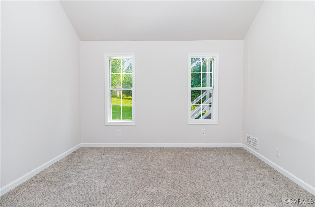 24 Hummingbird Lane Cumberland, VA 23040 - Photo 21 of 38 an empty room with windows