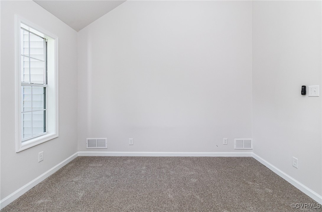 24 Hummingbird Lane Cumberland, VA 23040 - Photo 22 of 38 an empty room with a window