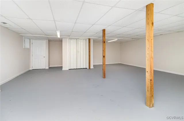 a view of empty room with windows