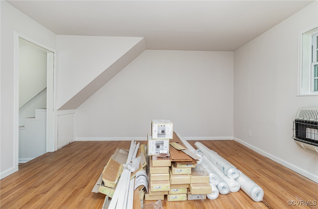 24 Hummingbird Lane Cumberland, VA 23040 - Photo 27 of 38 a view of a bedroom with wooden floor