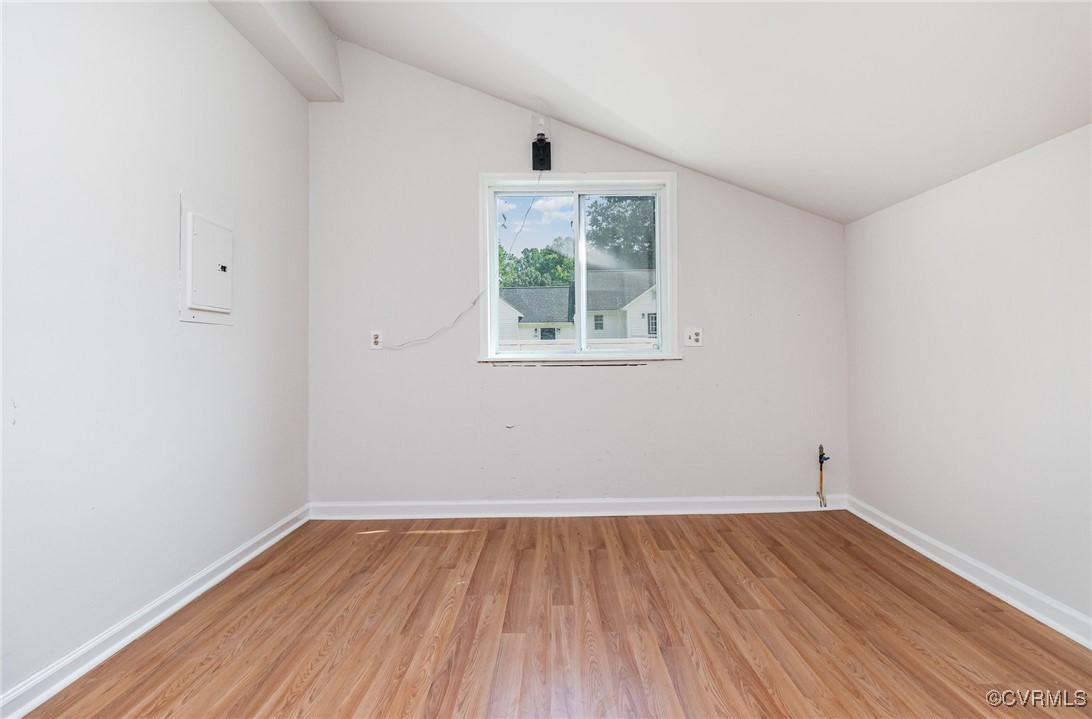 24 Hummingbird Lane Cumberland, VA 23040 - Photo 28 of 38 an empty room with wooden floor and windows