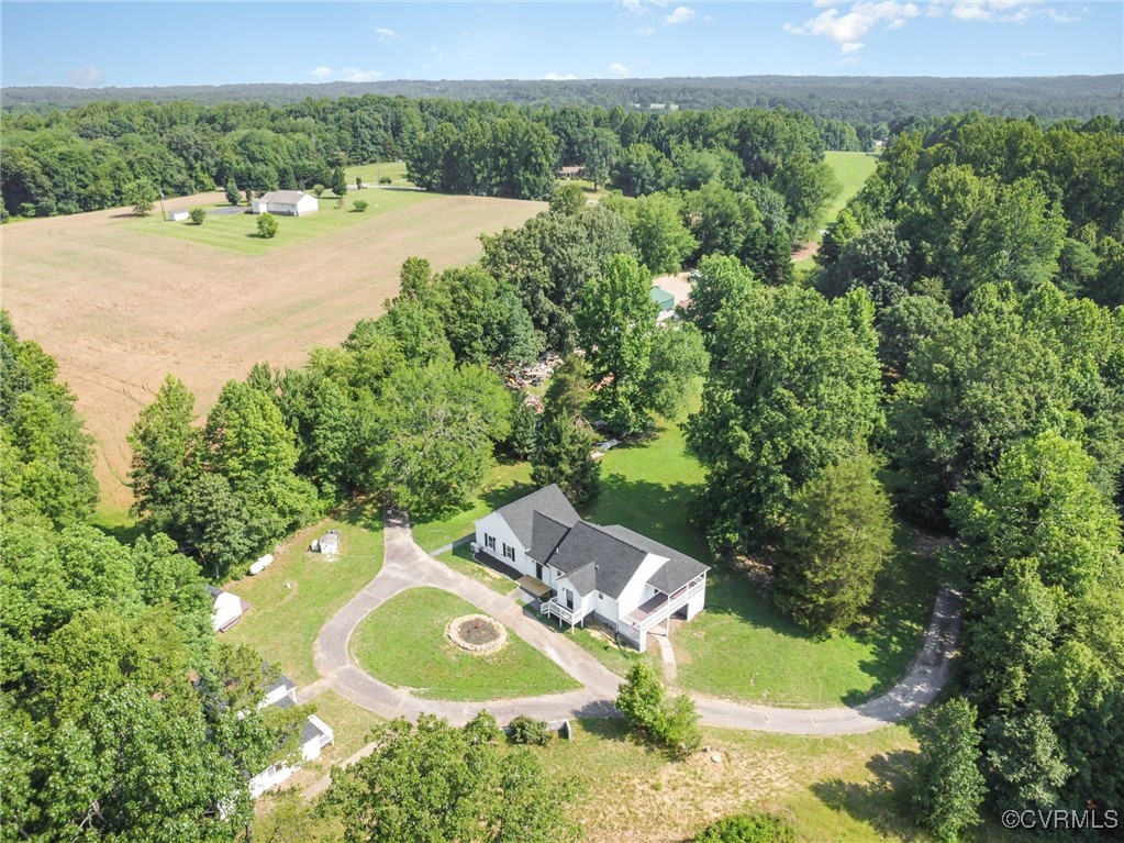 24 Hummingbird Lane Cumberland, VA 23040 - Photo 33 of 38 an aerial view of a house with a yard and lake view