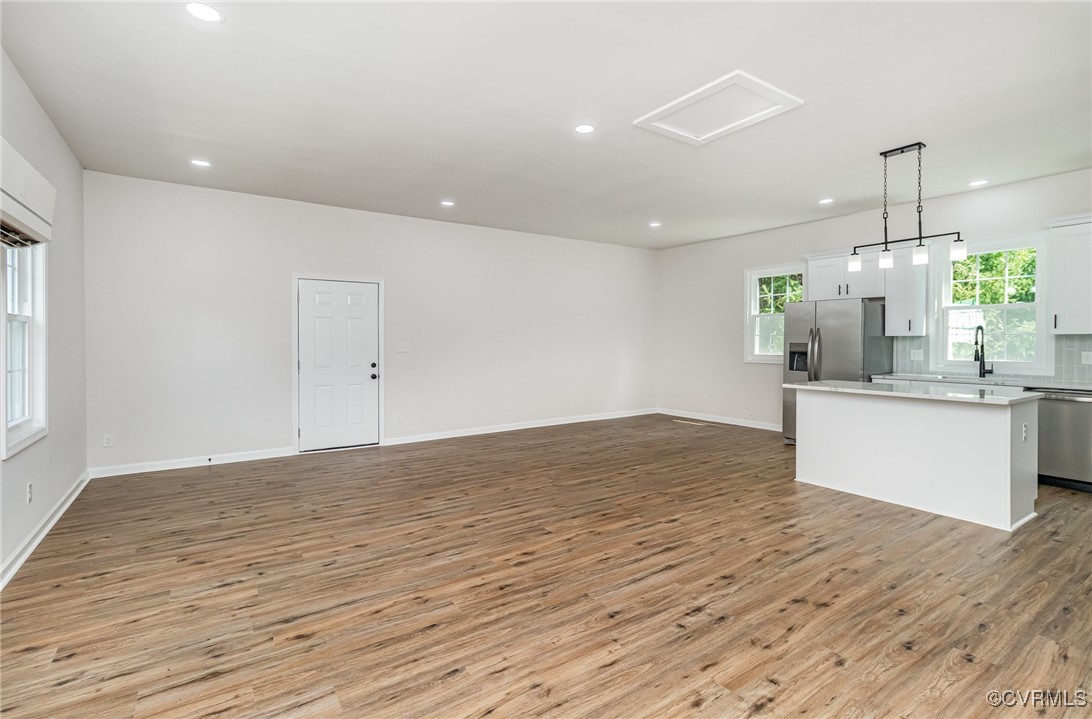 24 Hummingbird Lane Cumberland, VA 23040 - Photo 9 of 38 a view of kitchen and empty room
