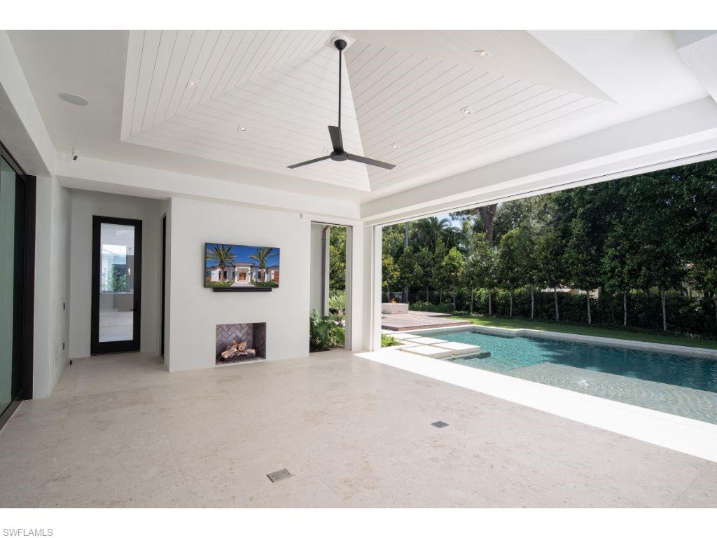 1325 Murex Drive Naples, FL 34102 - Photo 16 of 18 a view interior of a house a yard and a garage