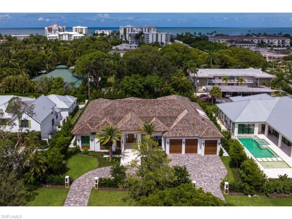 1325 Murex Drive Naples, FL 34102 - Photo 2 of 18 a aerial view of a house