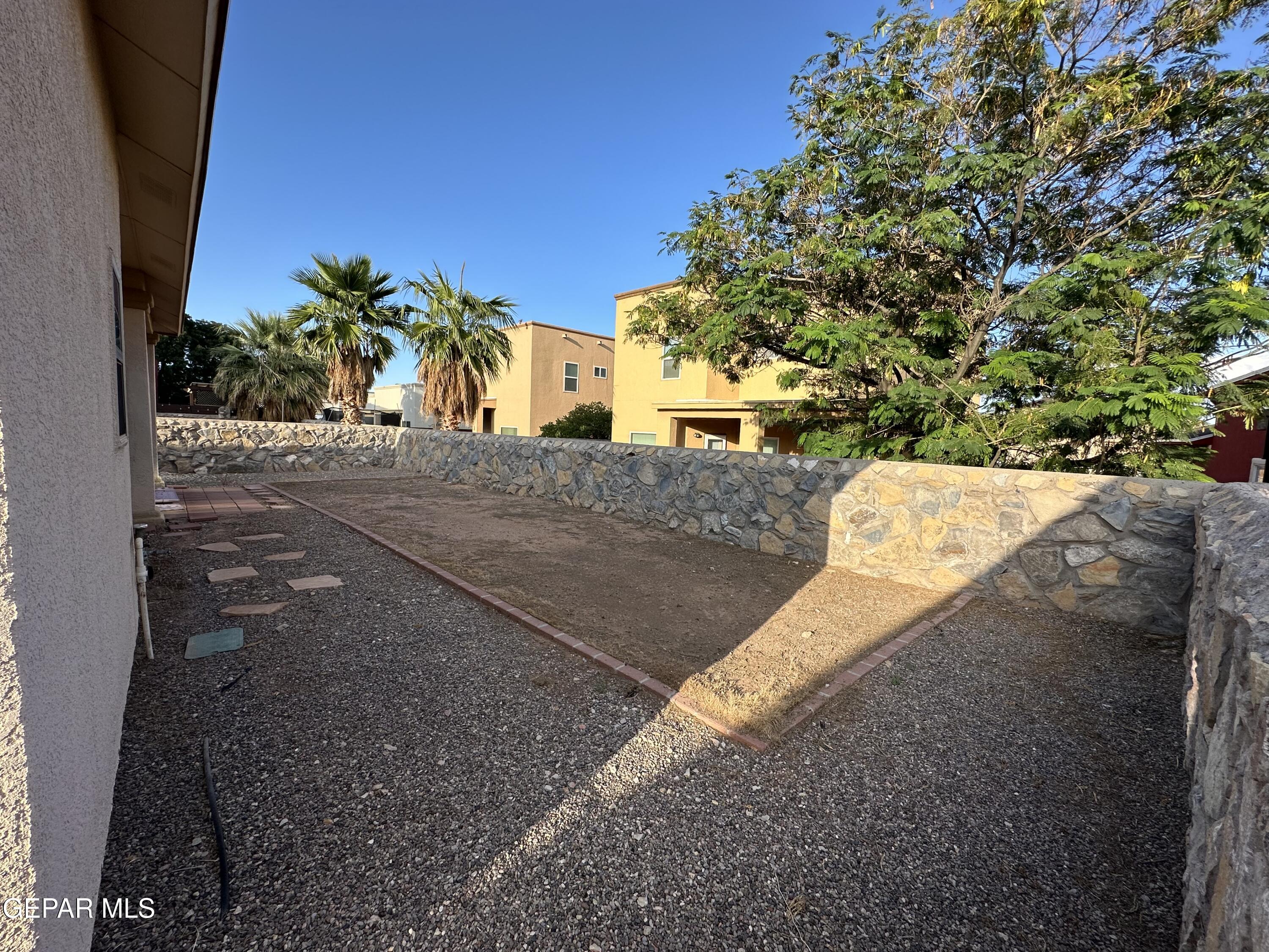 11528 Rafael Serna Lane El Paso, TX 79934 - Photo 13 of 22 a view of a tree with an outdoor space