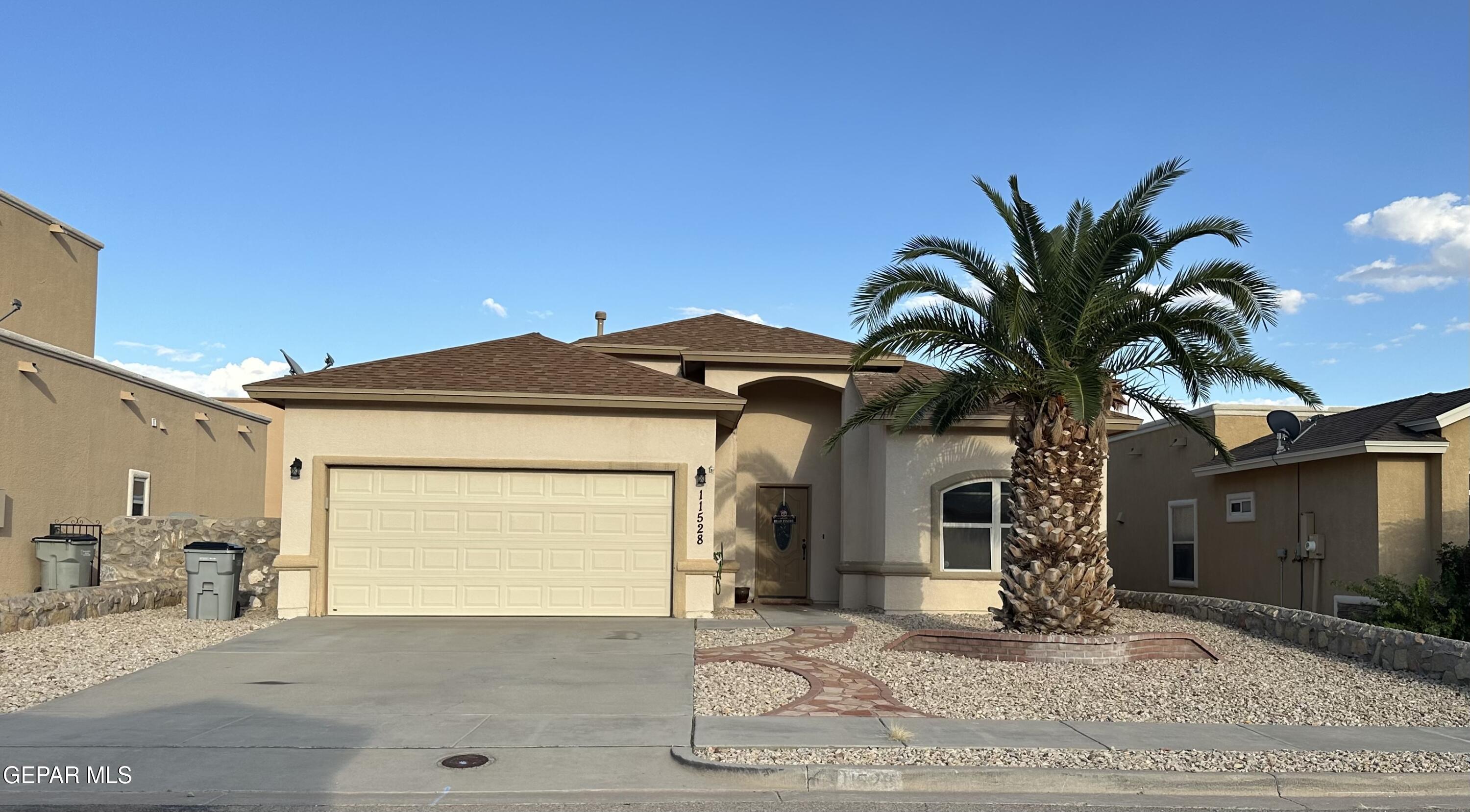 11528 Rafael Serna Lane El Paso, TX 79934 - Photo 3 of 22 a view of a house with a patio