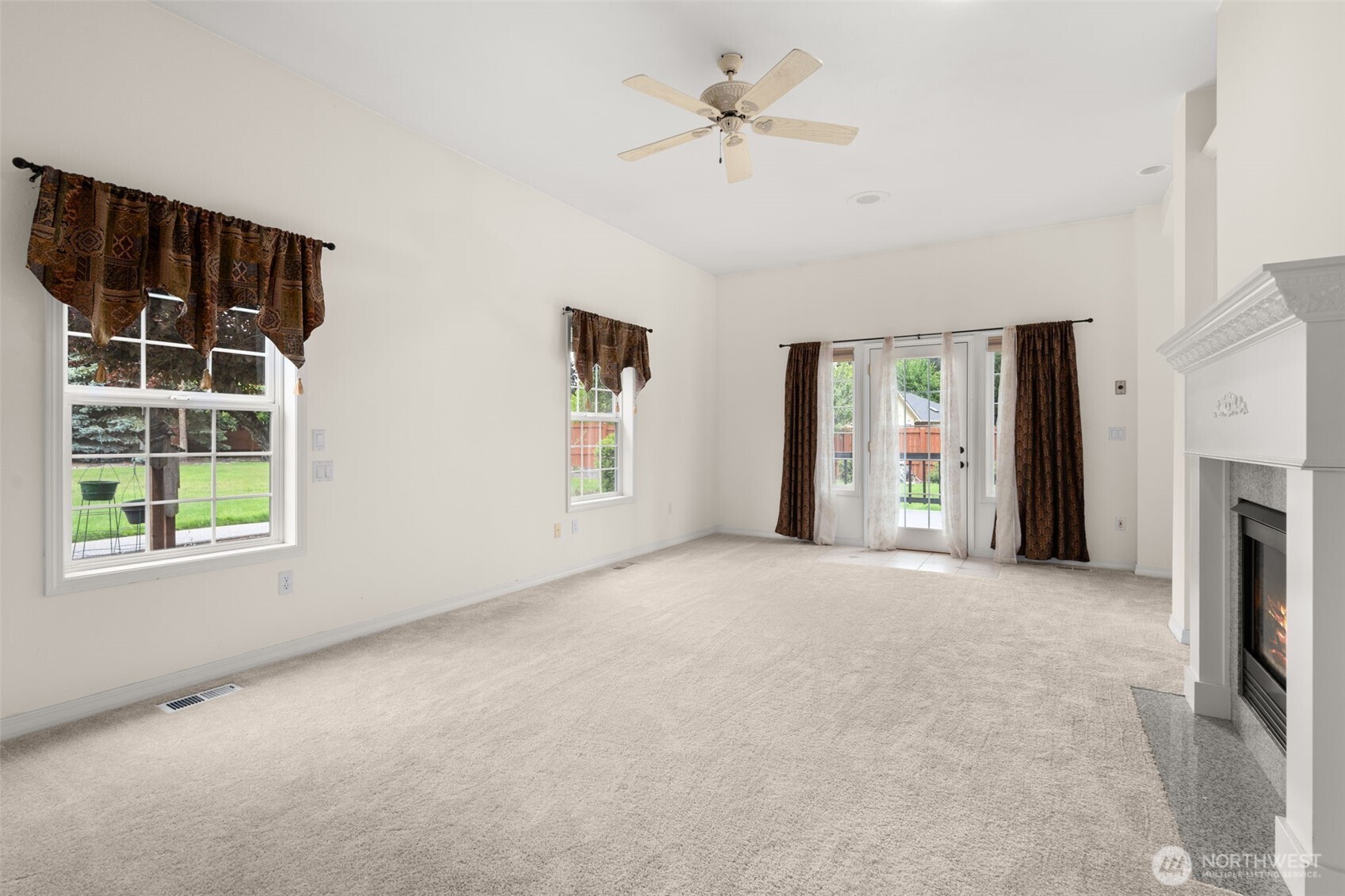 9609 346th Street South Roy, WA 98580 - Photo 13 of 37 a view of an empty room with a window