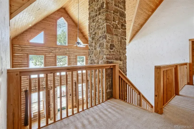 a bathroom with a white tub shower and vanity