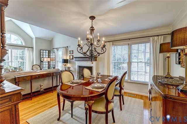 a kitchen with stainless steel appliances granite countertop a stove and cabinets