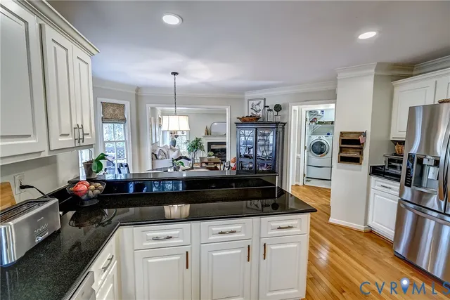 a view of a storage & utility room with a sink
