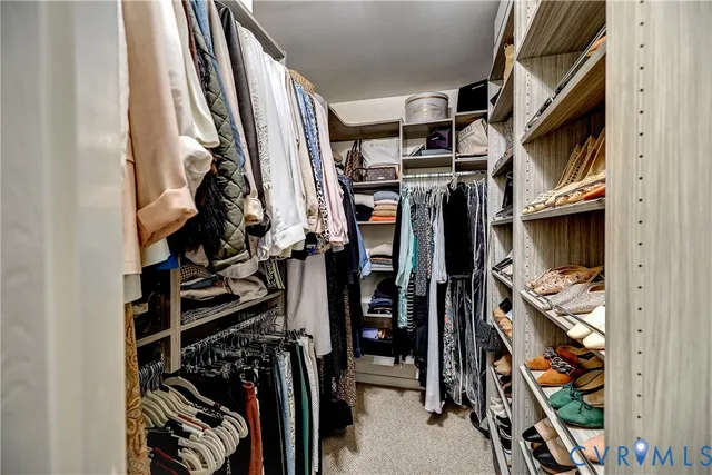 a view of backyard with a deck and wooden floor