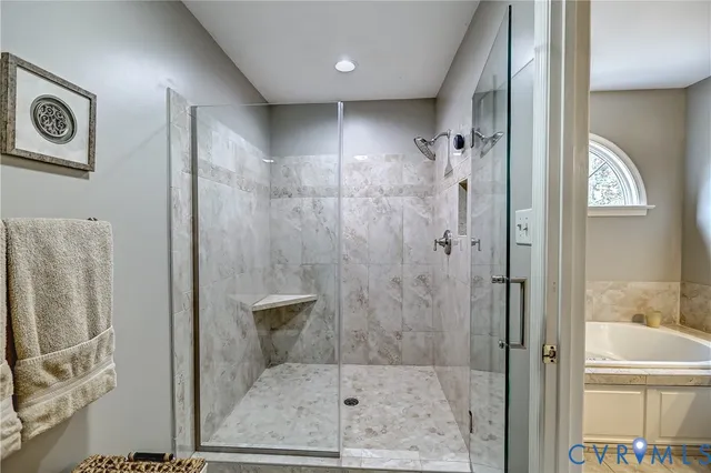 a view of a house with a yard and garage