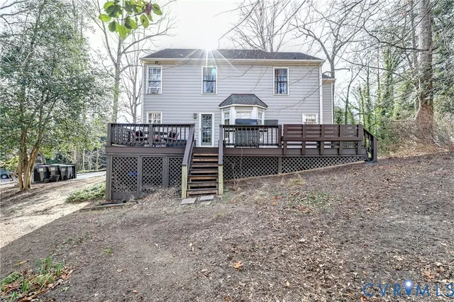 a view of a yard and front view of a house