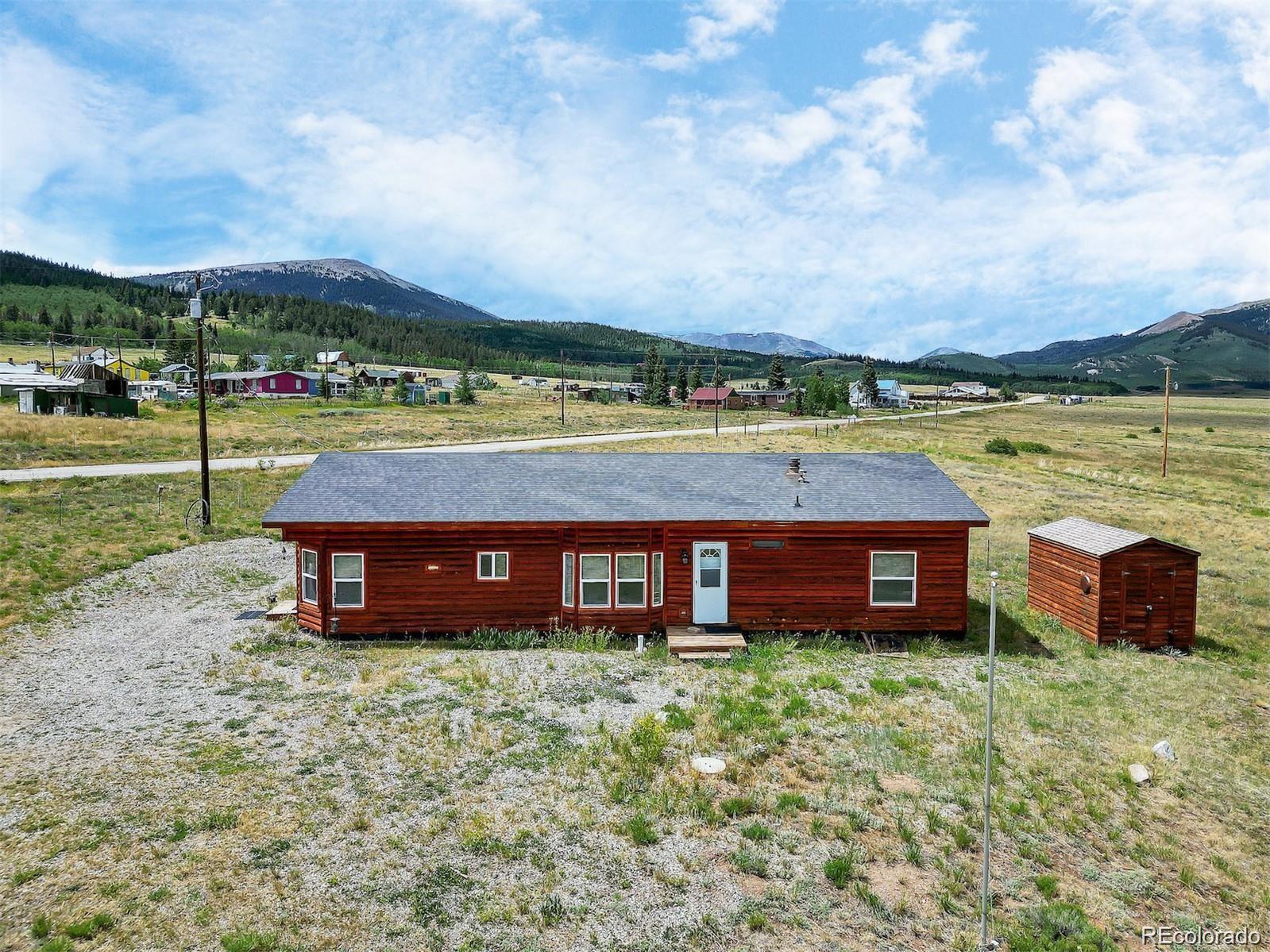 75 6th Street Como, CO 80432 - Photo 26 of 33 a view of a terrace with a lake view and mountain view