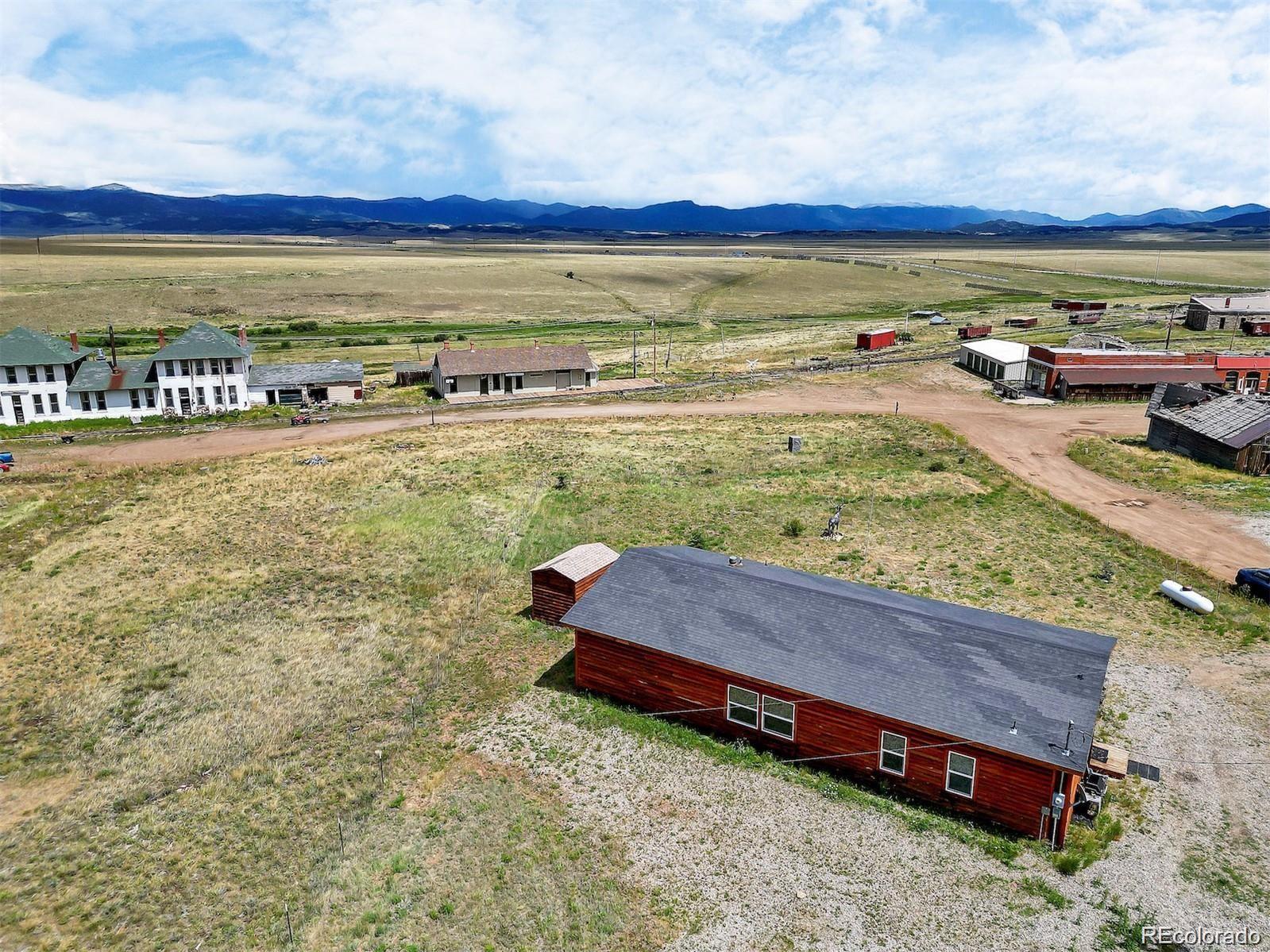 75 6th Street Como, CO 80432 - Photo 33 of 33 a view of a swimming pool with an ocean view