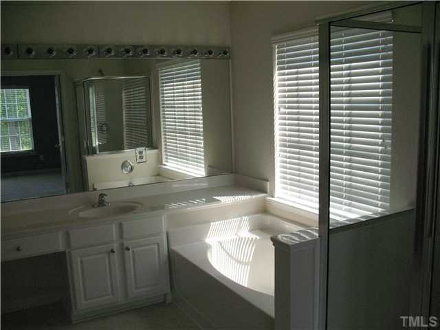 7409 Brandon Allen Avenue Raleigh, NC 27613 - Photo 8 of 14 Spacious Master Bath with garden tub and seperate shower.
