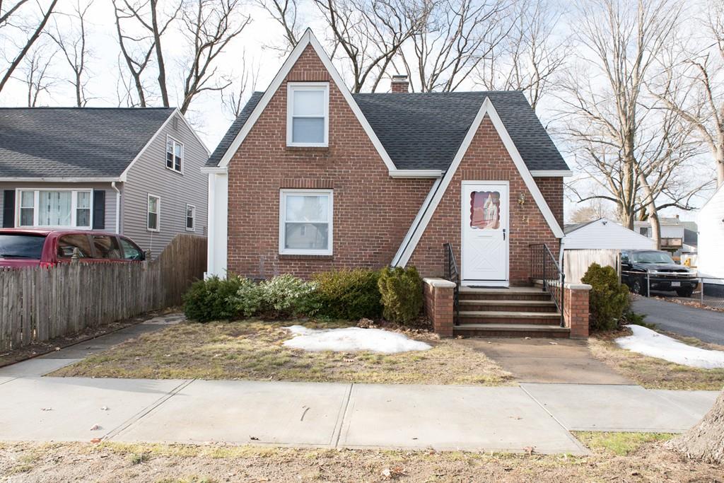 134 Draper Street Springfield, MA 01108 - Photo 1 of 23 a front view of a house with a yard