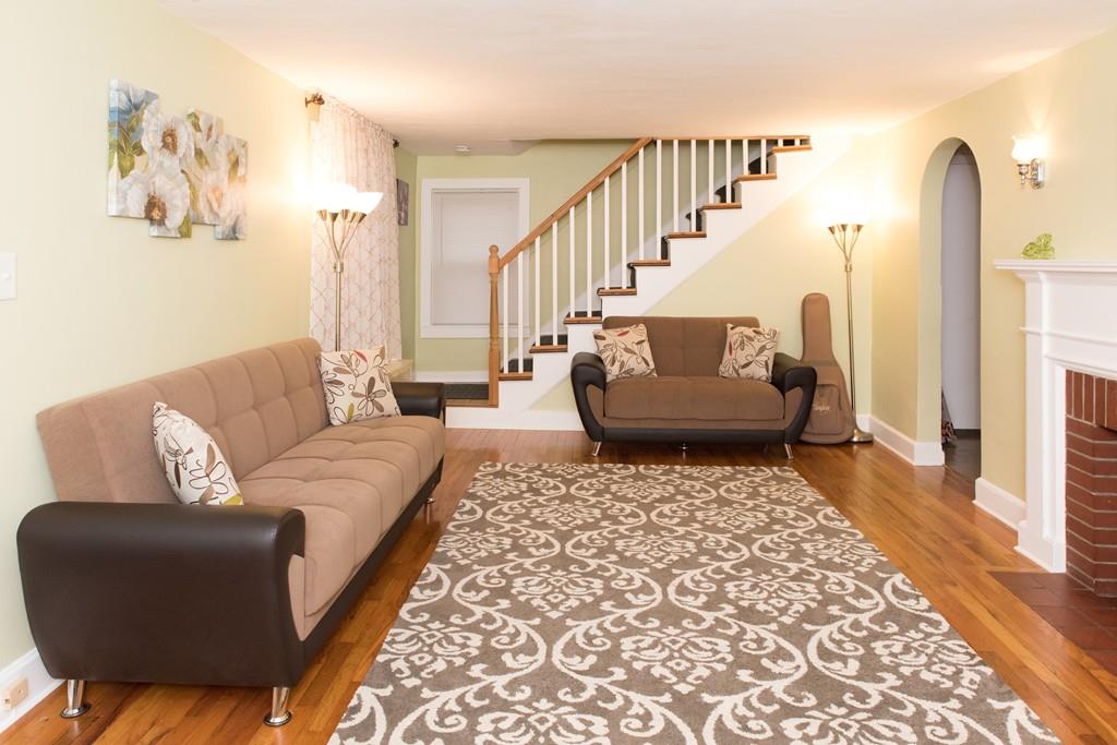 134 Draper Street Springfield, MA 01108 - Photo 13 of 23 a living room with furniture and a rug