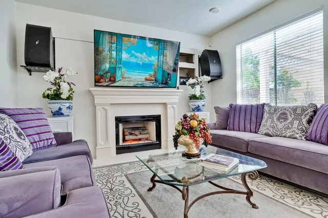 a living room with furniture and a couch