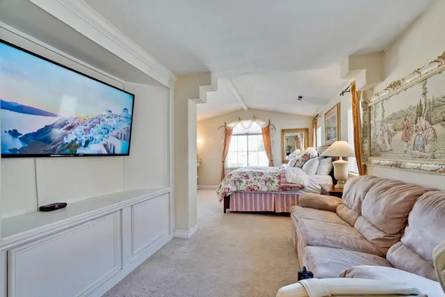 a view of cabinets and wooden floor