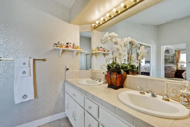 a bathroom with a shower and toilet