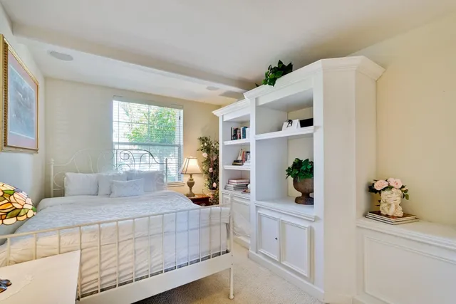 a bathroom with a shower and toilet