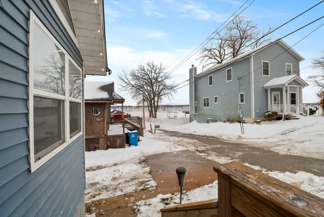 a living room with furniture and a christmas tree