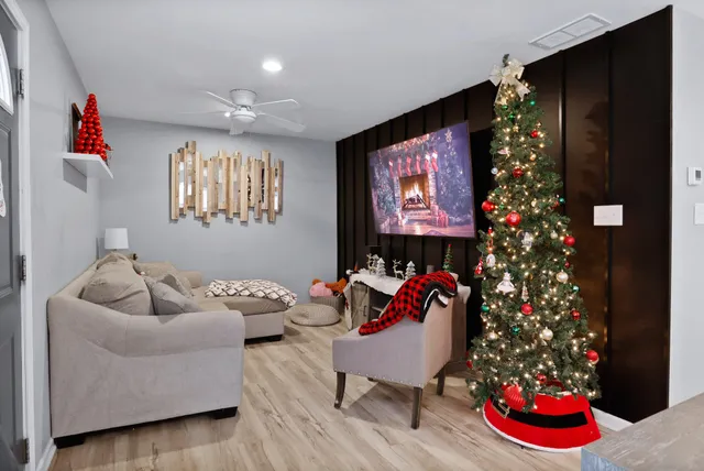 a room with toys and flower vase