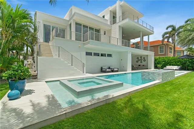 a view of a house with a swimming pool