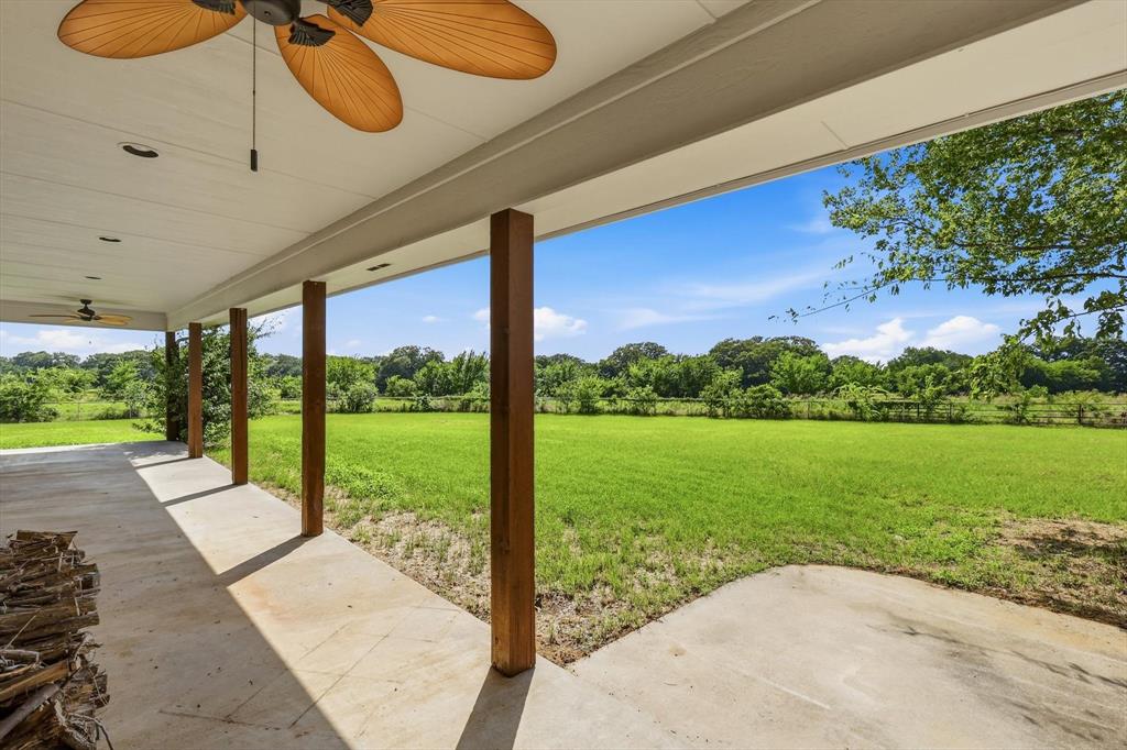 12190 Bell Road Pilot Point, TX 76258 - Photo 37 of 39 Covered patio featuring a ceiling fan with palm-style blades, recessed lighting, and a concrete surface