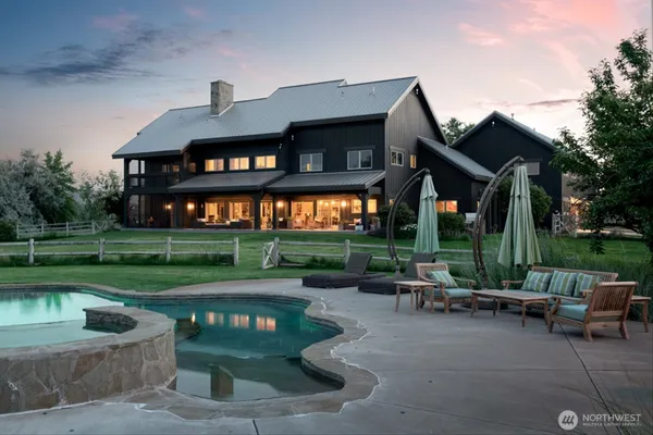 a view of a table and chairs in the patio
