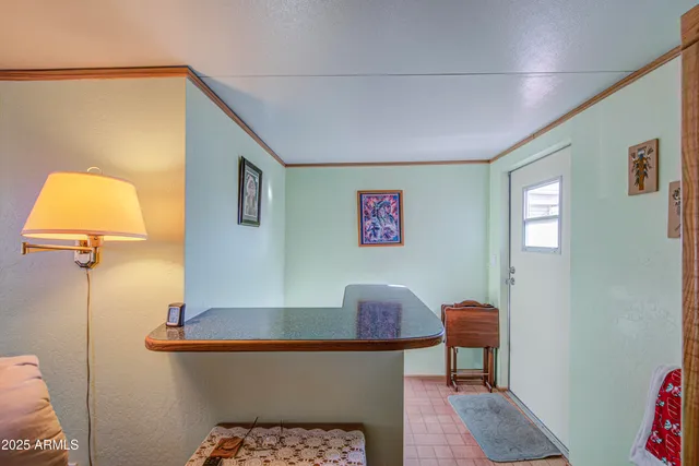 a workspace with furniture and window