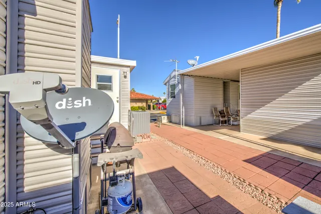 a view of balcony with furniture