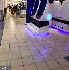 a swimming pool with outdoor seating