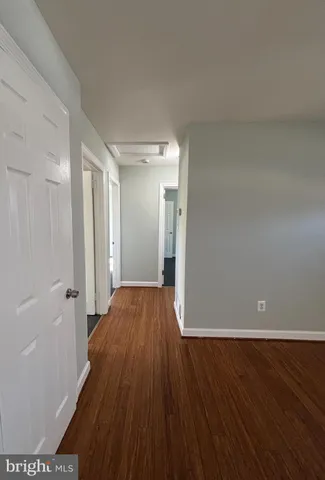 a view of a livingroom with wooden floor