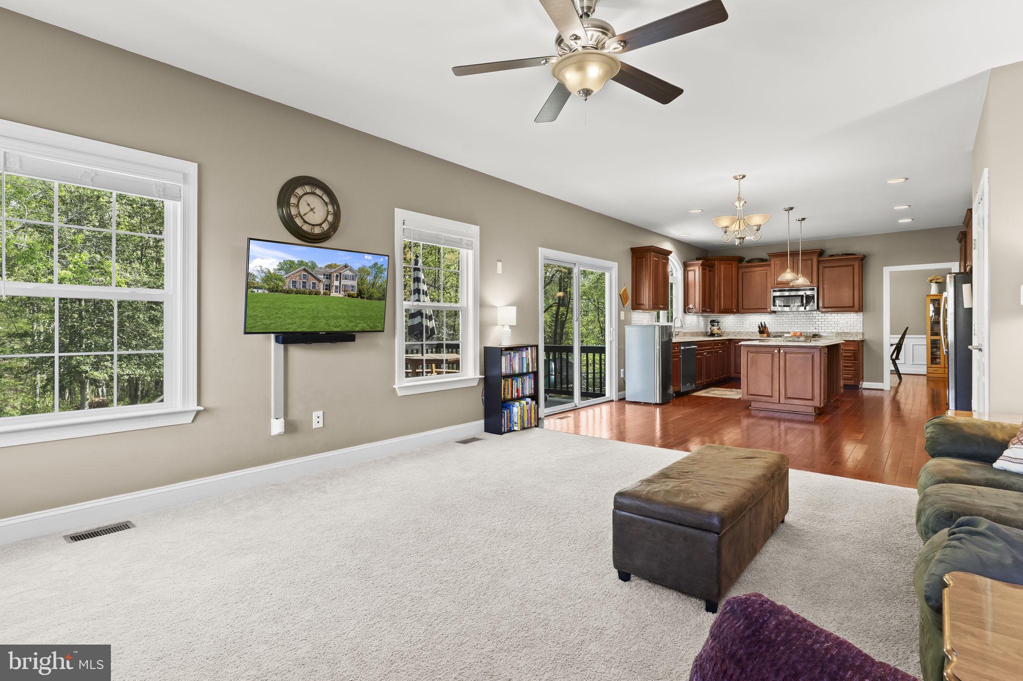 1905 Resting Ridge Lane Prince Frederick, MD 20678 - Photo 24 of 91 a living room with furniture and a large window