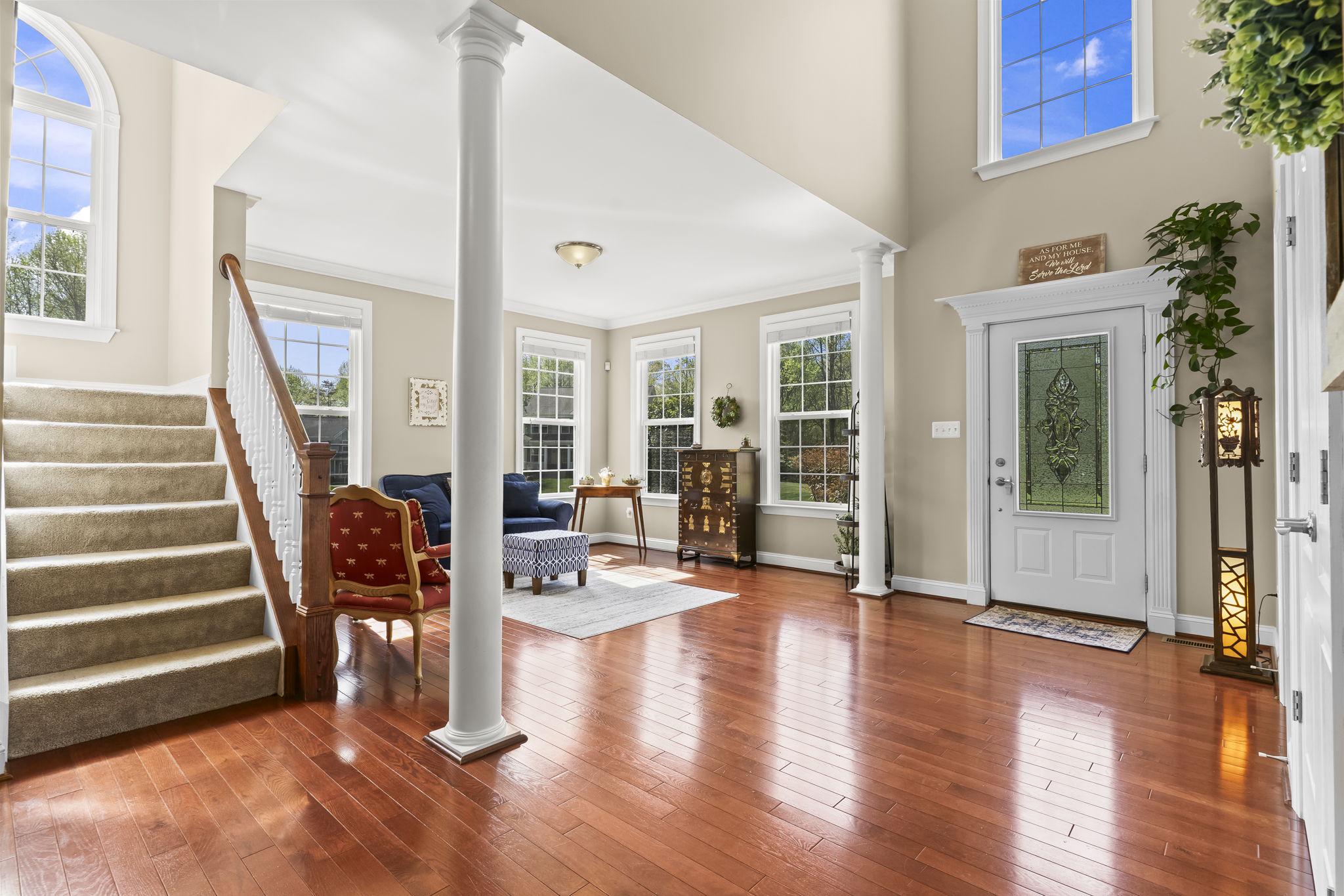 1905 Resting Ridge Lane Prince Frederick, MD 20678 - Photo 3 of 91 a view of a livingroom with furniture and hardwood floor