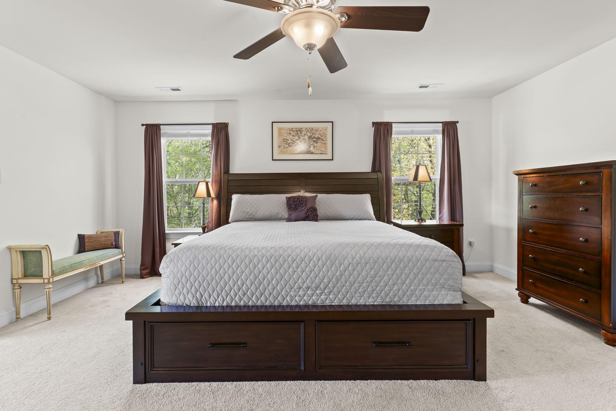 1905 Resting Ridge Lane Prince Frederick, MD 20678 - Photo 31 of 91 a bedroom with a bed and a dresser