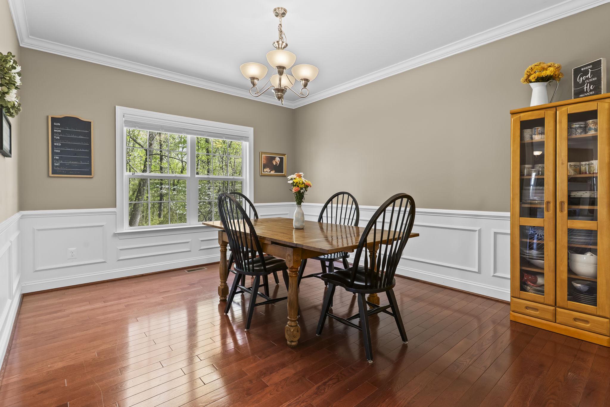 1905 Resting Ridge Lane Prince Frederick, MD 20678 - Photo 7 of 91 a view of a dining room with furniture window and wooden floor