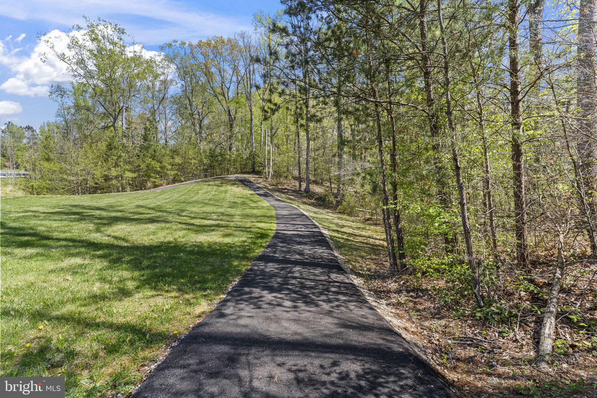 1905 Resting Ridge Lane Prince Frederick, MD 20678 - Photo 83 of 91 a view of a pathway both side of yard