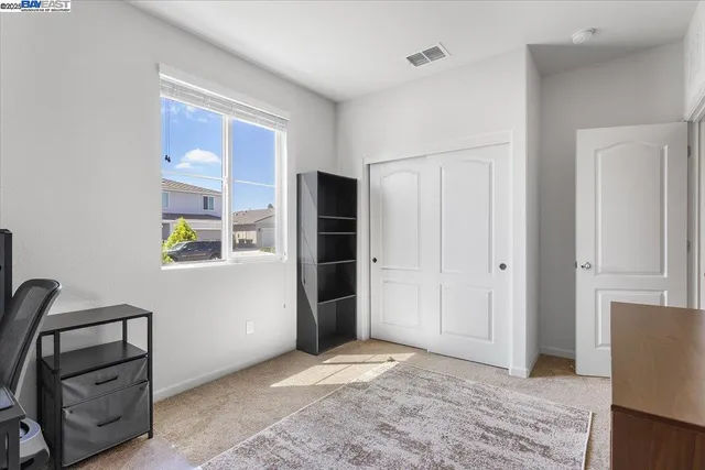 a view of room with furniture and natural light