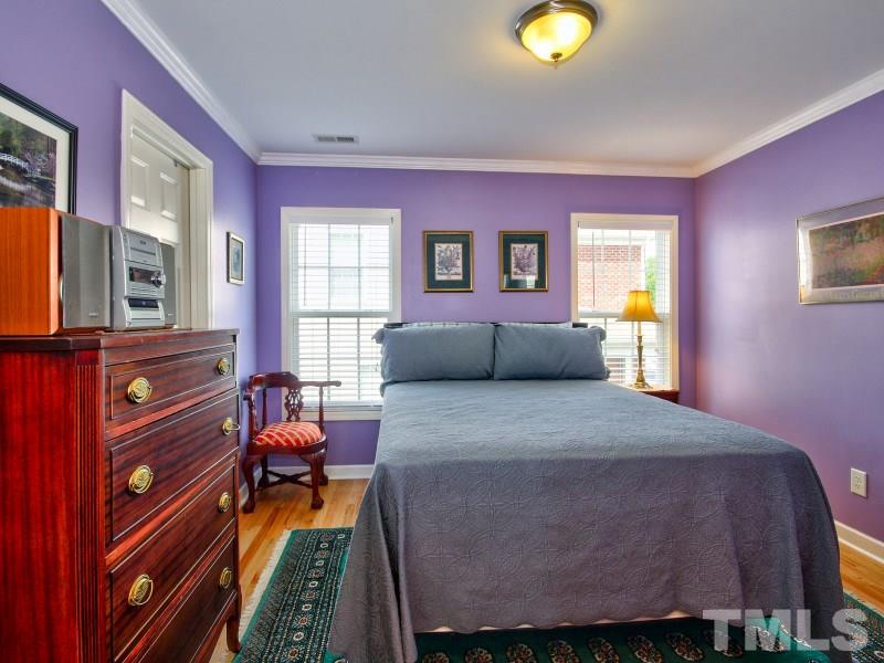5304 Jade Forest Trail Raleigh, NC 27616 - Photo 13 of 22 a bed room with a bed and a window
