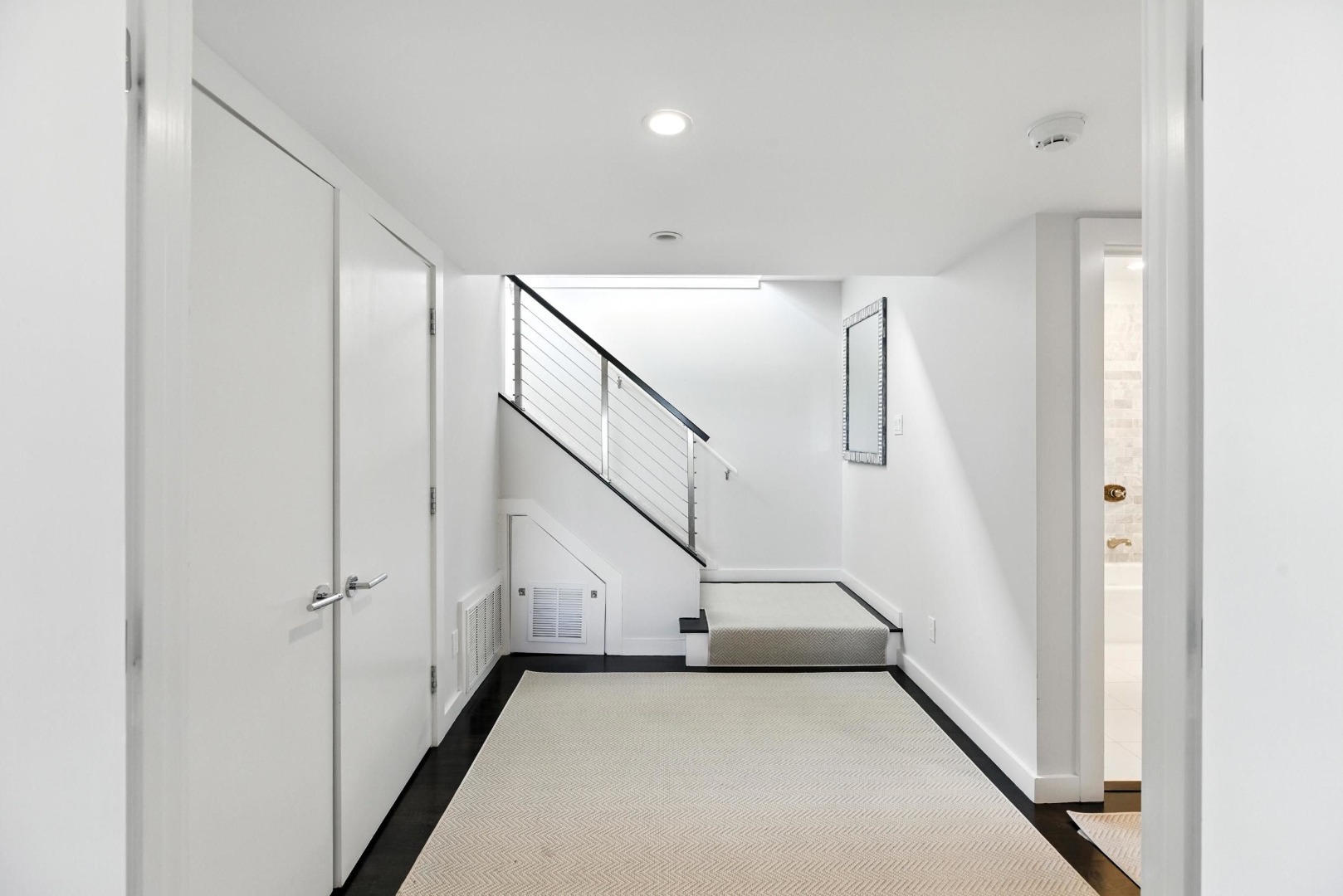 45 Starbuck Road Nantucket, MA 02554 - Photo 26 of 42 a view of a hallway with staircase
